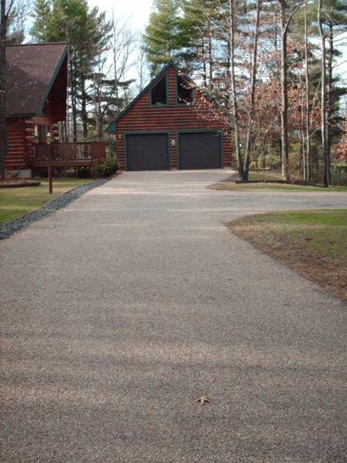 Oil and Stone driveway about 1 year old showing no loose stone