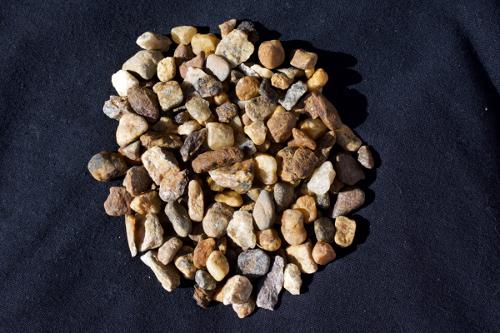 Gold Peastone - Offers deep gold tones for a fashionable surface that compliments your home's surroundings.